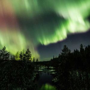 Northern lights in the river landscape